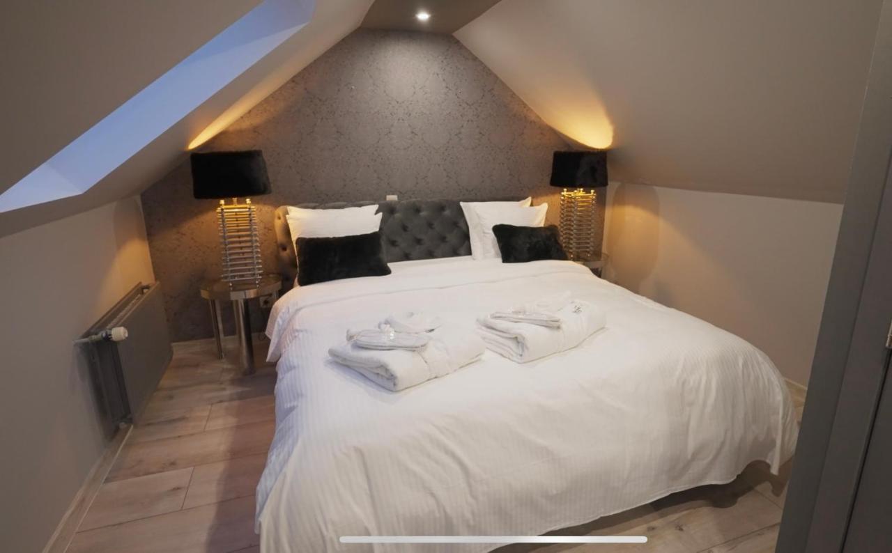 Les Suites M Wanze Exterior photo