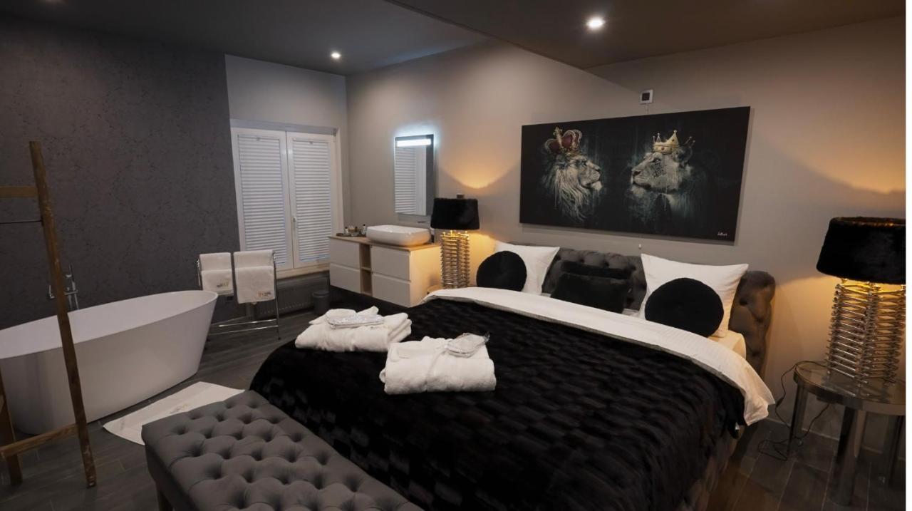 Les Suites M Wanze Exterior photo