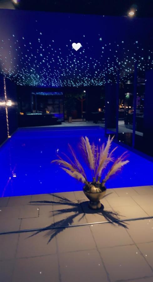 Les Suites M Wanze Exterior photo